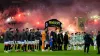 Fans let off pyrotechnics at the Premier Sports Cup final (Andrew Milligan/PA)