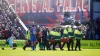 Crystal Palace’s Jean-Philippe Mateta is taken from the field on a stretcher (PA)