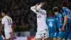 Aston Villa’s Matty Cash, center, reacts after a missed opportunity during the Champions League round of 16 first leg soccer